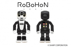 DMM.comは、シャープのモバイル型ロボット電話「RoBoHoN（ロボホン）」を販売する。（写真：同社発表資料より）
